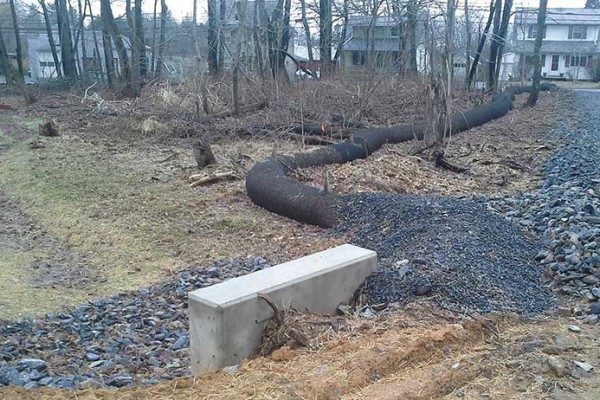 A picture of a drainage swale installed in Nazerath, Pa.