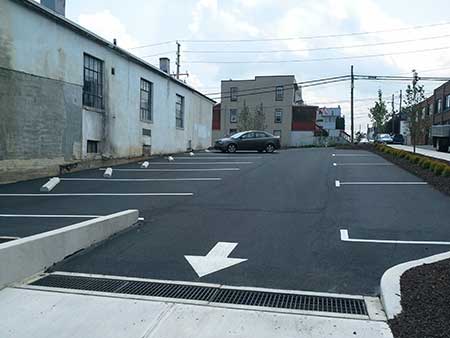 Picture of the smaller second parking lot installed along with sidewalks and curbing