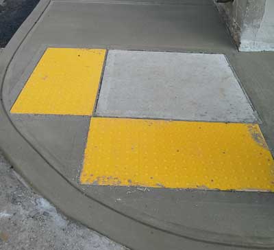 Sidewalk in Nazareth, Pa., corner with handicap assessibility.